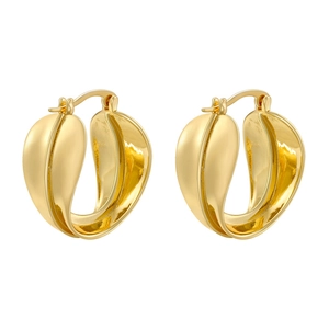 Detailed view of irregular golden leaf-shaped earrings with a smooth metallic finish