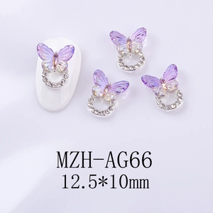 Detail of 3D purple gradient butterfly nail charms with rhinestones and dimensions