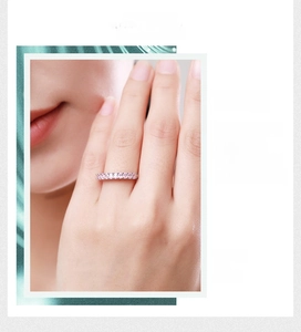 Detailed view of s925 silver ring featuring a row of round-cut pink zircon stones