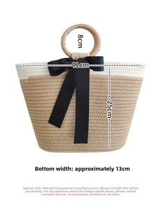 Size guide showing 41cm width and 25cm height for the woven tote bag with a black bow
