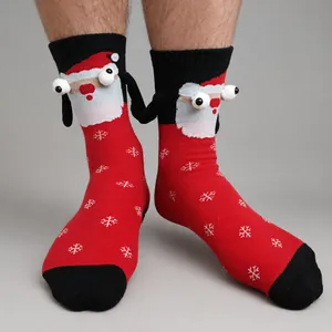 Detail view of Christmas magnetic socks with 3D Santa hands on cozy knitted cotton