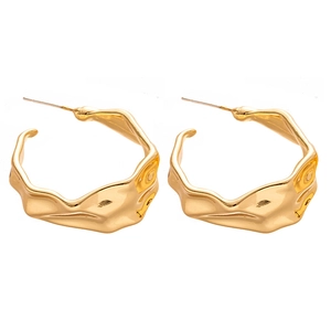 Elegant gold C-shaped hoop earrings with irregular wrinkled texture and glossy finish