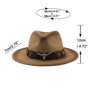 Chapeau de cowboy en paille marron avec bande en cuir et tête de taureau argentée