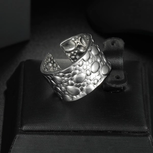 Silver geometric stainless steel wide open ring with embossed pebble texture details