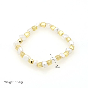 Detail of 18k gold plated bracelet with 8mm white pearls and golden square beads