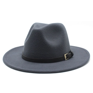 Detail of dark gray wool fedora hat featuring a black leather band and gold metal buckle