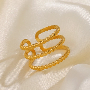 Elegant 3-layer golden beaded stainless steel open ring on a soft silk background