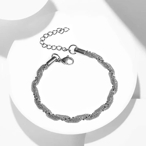 Detail of silver twisted mesh chain bracelet with adjustable lobster clasp and extender
