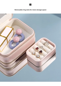 Macro view of portable pink jewelry box with removable ring slot and soft velvet lining