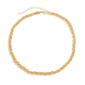 Detail of gold twisted chain necklace with secure lobster clasp and adjustable link chain