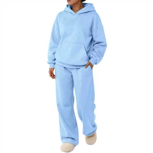 Men's light blue hoodie and pants set featuring drop shoulder sleeves and loose fit design