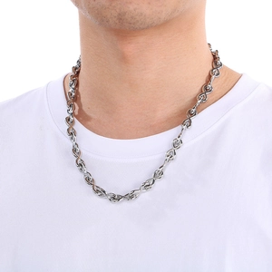 Detailed view of silver infinity link chain necklace for men in polished stainless steel
