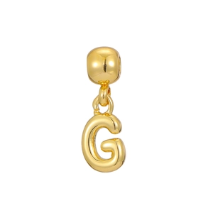 Macro detail of 18k gold plated balloon style letter G pendant for DIY necklaces