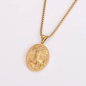 Close-up of gold oval pendant featuring detailed religious Virgin Mary engraving on box chain