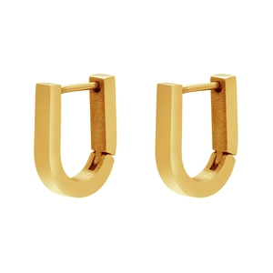 Macro shot of minimalist gold U-shaped hoop earrings with a matte metallic finish