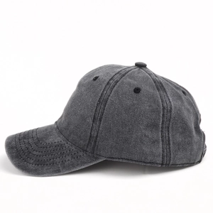 Detailed side view of washed charcoal grey cotton baseball cap with reinforced stitching
