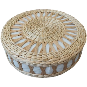 Handwoven round straw tatami cushion with natural texture for meditation and seating