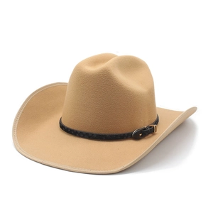 Detail of khaki western cowboy hat with black leather textured band and gold buckle
