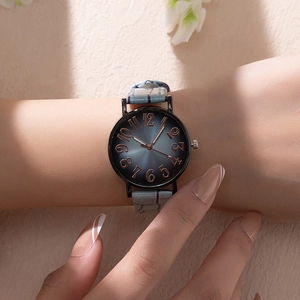 Fashionable women's quartz watch with blue gradient dial and light blue leather strap