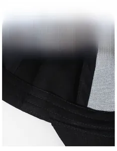 Detail of the widened moisture-wicking sweatband inside a black cotton baseball cap