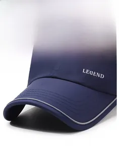 Macro shot of navy baseball cap with white brim edge and K LEGEND embroidery detail