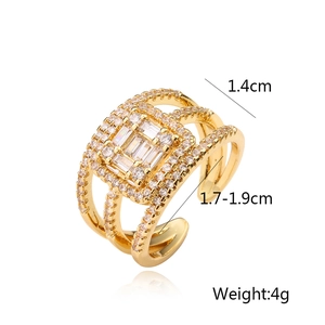 Detail view of gold layered ring with crystal stones and size dimensions info