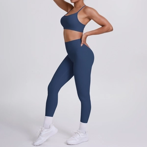 Seitenansicht des dunkelblauen Yoga-Sets mit hoher Taille Leggings und Sport-BH mit Trägern