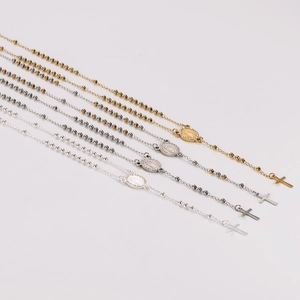 Vintage stainless steel rosary necklaces with cross pendants in gold and silver finishes