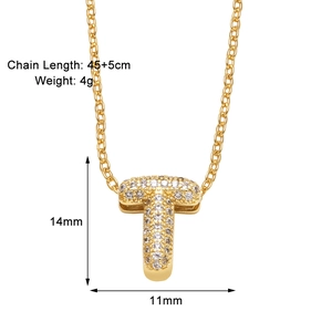 Detail view of gold letter T necklace pendant with white cubic zirconia and size dimensions