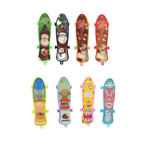 Mini plastic finger skateboards with colorful Christmas and Happy Easter holiday designs