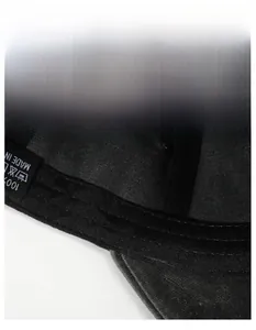 Detail shot of the black interior sweatband and care label on the washed baseball cap