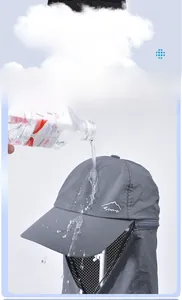 Close-up of waterproof nylon fabric with water droplets on a gray sun hat with neck flap