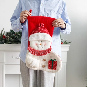 Large red and white knitted Christmas stocking with 3D snowman and wooden buttons