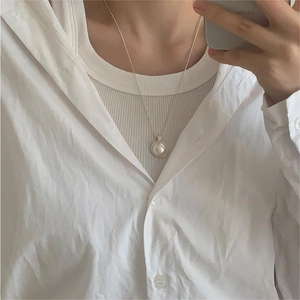 Minimalist 925 sterling silver necklace with pearl pendant shown in a mirror selfie