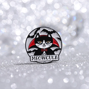 Gothic Meowcula enamel pin with black cat Dracula design on silver glitter background