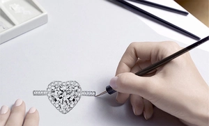 Macro view of a heart-shaped diamond ring design featuring micro-pave setting on the band