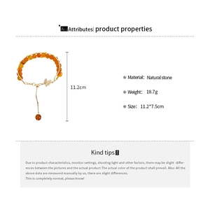 Detail view of orange natural stone bracelet with butterfly pendant and size specifications