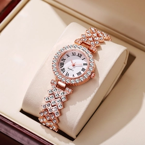 Elegant rose gold rhinestone quartz women watch with Roman numerals and dazzling crystal chain strap.