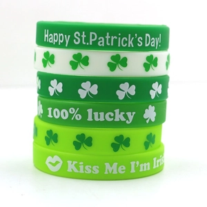 Set of 6 St. Patrick's Day silicone wristbands featuring clover motifs and lucky slogans