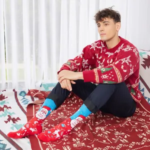 Festive Christmas mid-calf socks with Santa and Reindeer patterns in red and blue colors