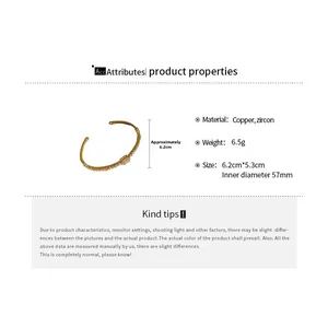 Detail showing 57mm inner diameter of gold plated zircon bangle with dimensions