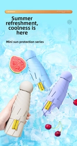 UPF 50+ sun umbrellas in blue, purple, and beige displayed on ice cubes for cooling effect