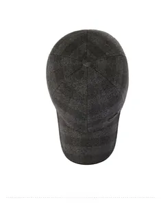 Detailed top view of a dark grey checkered wool baseball cap with thick fabric texture