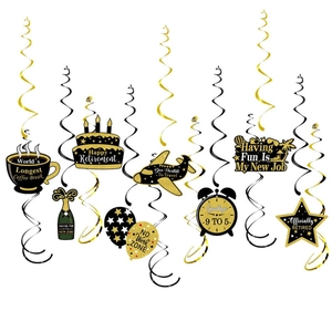 Retirement party hanging swirl decorations in black and gold with various festive cards