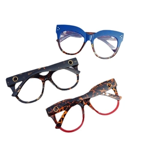 Retro oval cat eye glasses with rivet details in blue, black, and red leopard frames