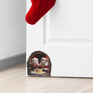 Detailed Christmas mouse hole wall sticker with 3D effect on a white door and wood floor