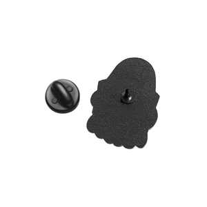 Detail view of the black metal back and rubber clutch for ghost reading brooch
