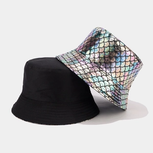 Reversible bucket hat with colorful fish scale pattern and solid black fabric
