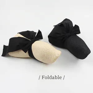 Foldable straw sun hat with large bow decoration for women beach vacation