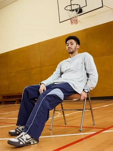 Men's casual sports suit featuring grey crewneck sweatshirt and navy loose trousers
